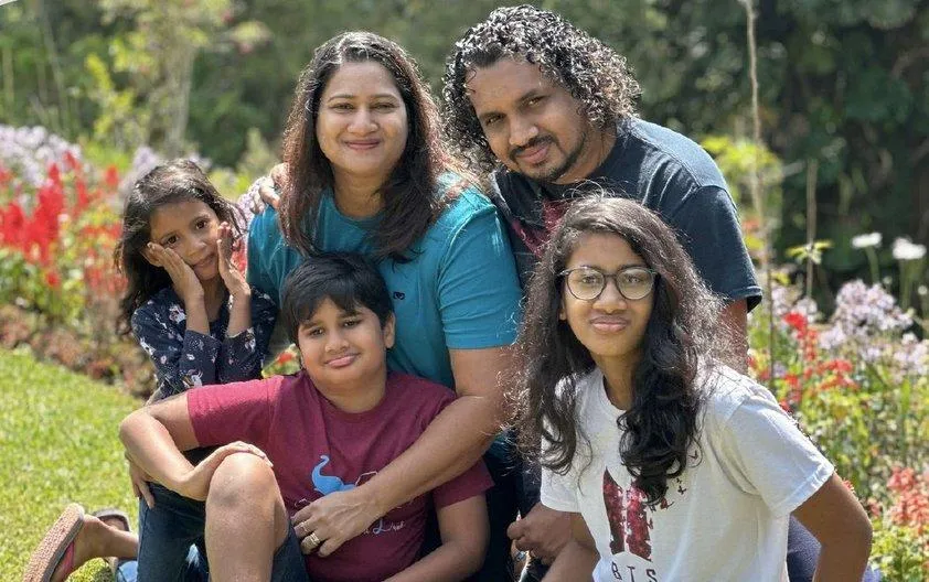 Timothy and Viji Daniel with their family